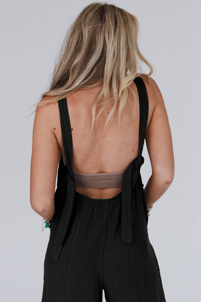 Black Solid Color Pockets Pleated Flare Leg Jumpsuit