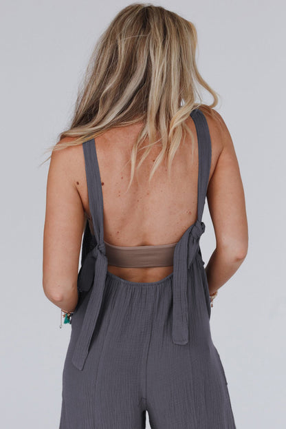 Black Solid Color Pockets Pleated Flare Leg Jumpsuit